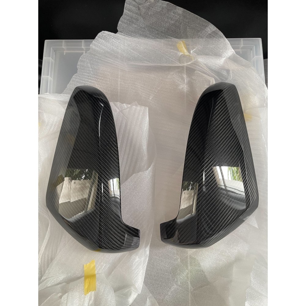 ครอบกระจกเพียวคาร์บอนแท้ ISUZU D-MAX / MU-X 2020-ปัจจุบัน (1 คู่)